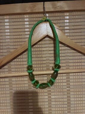 Green thread and glass bead necklace
